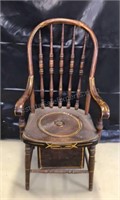 Antique spindle bow back commode chair.