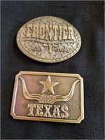 Two belt buckles 3.25 inch wide Frontier Hotel