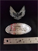 Vintage Ford emblem and vintage T Bird emblem