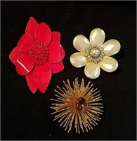 Three vintage floral brooches one marked Sarah