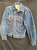 Vintage Levi Strauss size 36 jean jacket has a