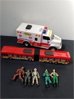 Tonka ambulance, Action Hero figures, and a city