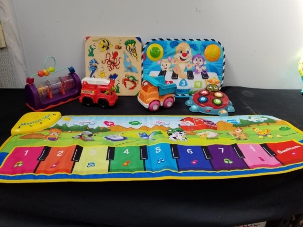 Toddler toys and a musical mat