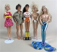 (4) Barbies & (1) Ken Doll