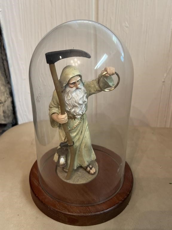Father Time In A Glass Display