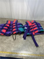 Stearns slalom ski water vests, one is adult