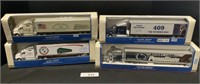 4 NOS Advertising Die Cast Transporter Trucks.