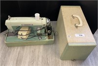 Portable Vintage Princess De Luxe Sewing Machine.