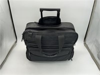 MULTI-SECTIONED TRAVEL BAG ON WHEELS