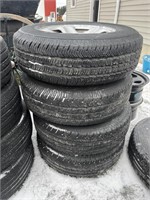 4 Goodyear Wrangler ST tires w/ rims: P225/75R16