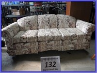 LARGE FLORAL SOFA WITH PULLOUT BED-GOOD CONDITION