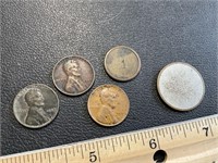 Misc. pennies and 2 “slugs”??