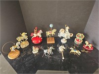 11 pieces of assorted carousel figurines