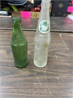 Sprite and Canada dry glass bottles