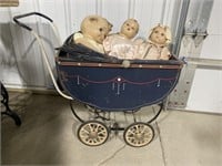 Vintage doll stroller with dolls