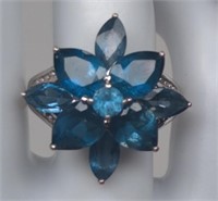 Sterling Ladies Blue Topaz Floral Ring 
Nice