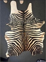 Zebra hide rug