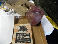 Pottery lamp and book