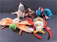 Four Beanie Babies with Tags - Dinosaurs and Bugs