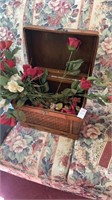 Wooden hinged box with faux flowers