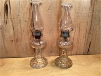 A pair of oil lamps