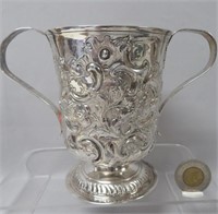 Sterling 2-handled cup, repousse, Newcastle,