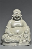 A JIN DYNASTY DINGYAO SEATED FIGURE OF BUDDHA