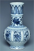 A YUAN DYNASTY BLUE AND WHITE VASE