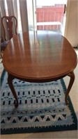 Thomasville dinning room table with 4 regular
