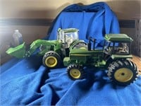 Two JD Toy Tractors