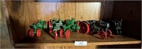 Shelf of Die Cast and Iron Farm Toys