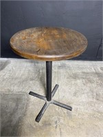 Round bar table. Wood top & metal frame.