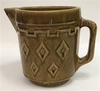 Brown Pottery Pitcher