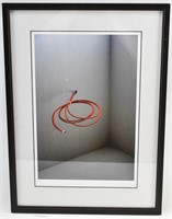 Photograph of Red Cord Coming out of Wall