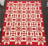 Red And White Handsewn Quilt