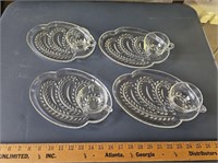 Glass teacupts w/ matching saucers