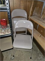 2 metal folding chairs