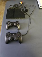 Playstation 2 w/ 2 controllers & cords
