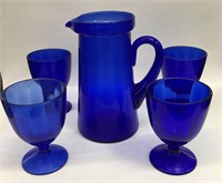 Blue Glass Pitcher And 4 Cups