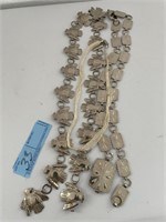 Concho belts and liquid silver looking necklace