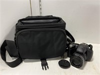 Fujifilm camera in roots bag