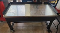 ROLL AROUND METAL TABLE SS TOP 60" X 30" X 35"