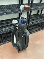 Wilson golf bag with clubs