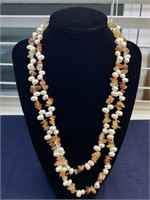 Pearl gemstone necklace with adjustable clasp