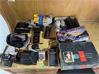 Assortment of Camera Supply- Cannon, Polaroid etc