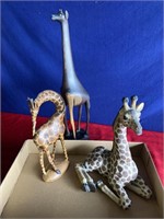 Two wood carvings and a resin giraffe