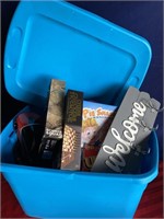 Blue tote with games and miscellaneous