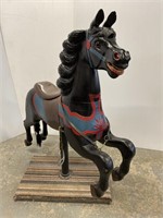 Carved and painted carousel horse