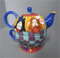 Cat ceramic tea kettle.
