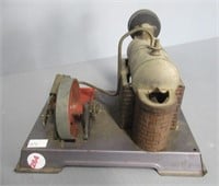 Steam engine toy. Measures: 5.25" H x 8" W.